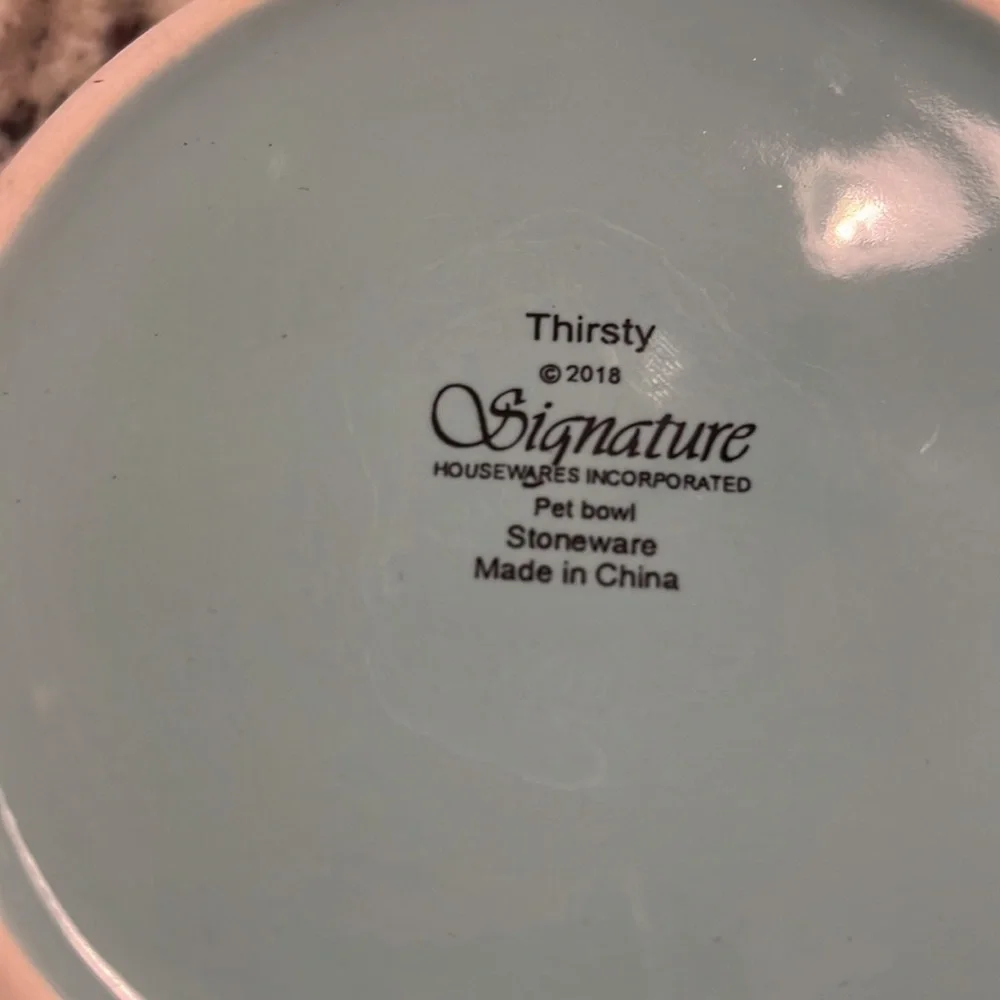 Two stoneware Pet bowls